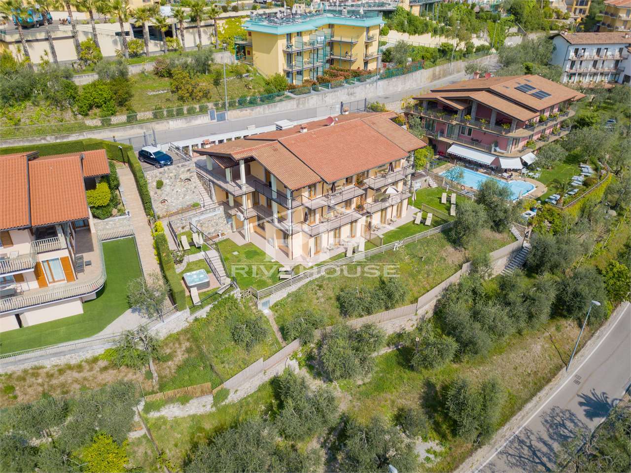 REF. 17 – RESIDENTIAL COMPLEX WITH SIX LAKE-VIEW APARTMENTS