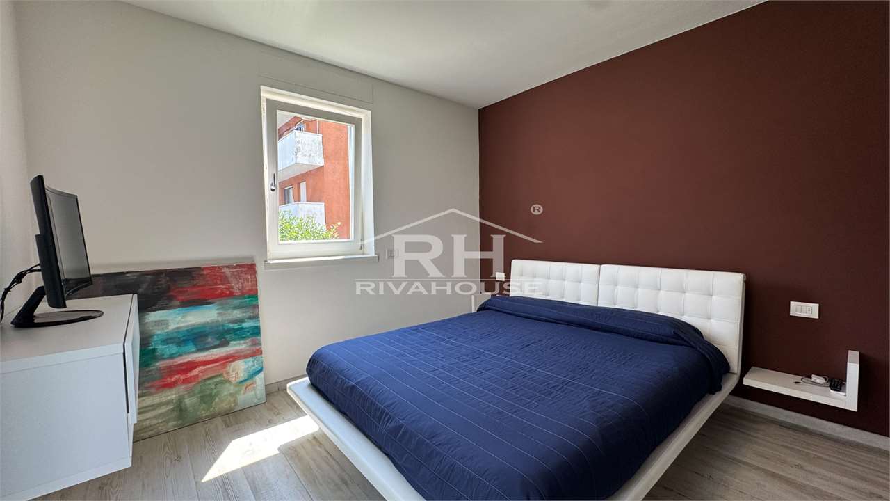 RIF. 11 - AMPIO TRILOCALE IN VENDITA A RIVA CENTRO, CON GARAGE E TERRAZZI