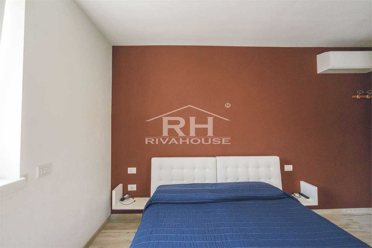 RIF. 11 - AMPIO TRILOCALE IN VENDITA A RIVA CENTRO, CON GARAGE E TERRAZZI