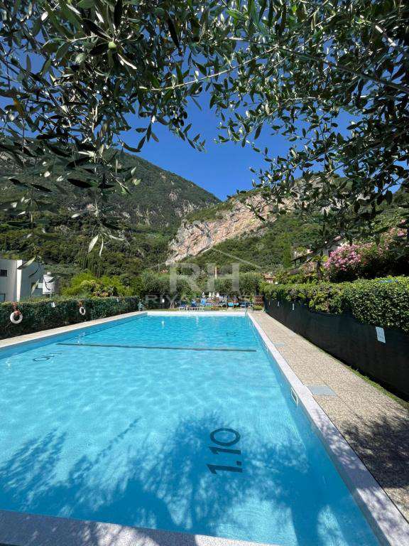 RIF. 01 - BILOCALE VISTA LAGO ESENTE GILMOZZI, CON PISCINA