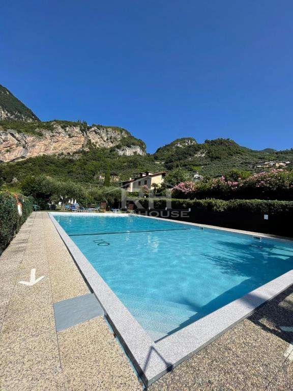 RIF. 01 - BILOCALE VISTA LAGO ESENTE GILMOZZI, CON PISCINA